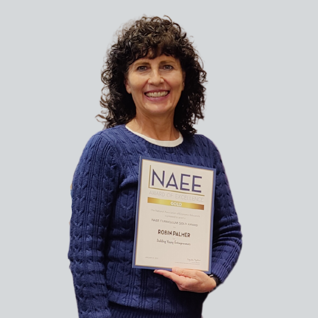 Photo of Robin Palmer with NAEE award