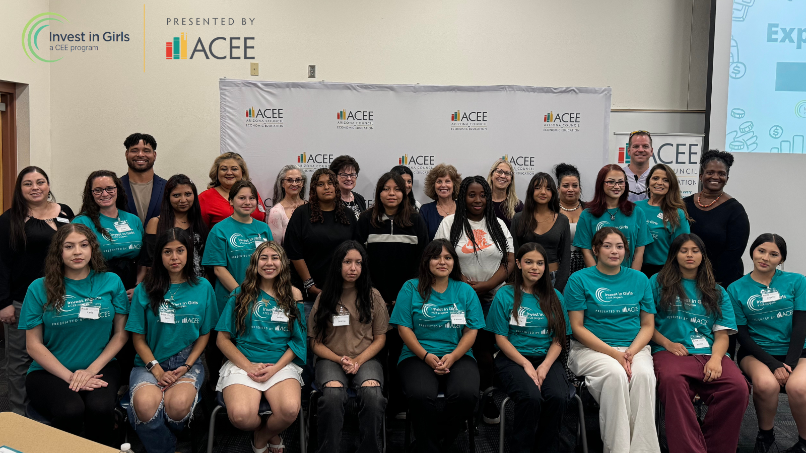 Photo of a group of high school girls and volunteers