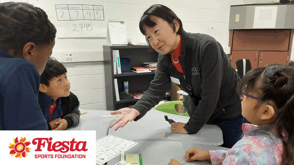 Photo of Elena Zee working with students